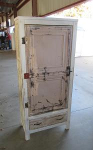 Primitive-style cabinet made from repurposed materials