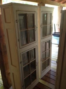 Primitive-style cabinet made from repurposed materials