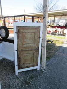 Primitive-style cabinet made from repurposed materials