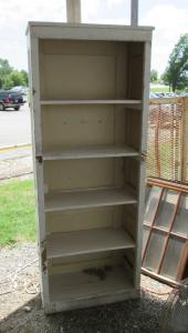 Primitive-style cabinet made from repurposed materials