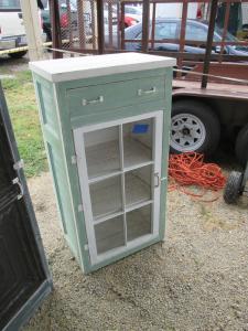 Primitive-style cabinet made from repurposed materials
