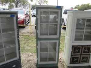 Primitive-style cabinet made from repurposed materials