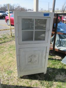 Primitive-style cabinet made from repurposed materials