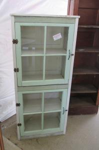 Primitive-style cabinet made from repurposed materials