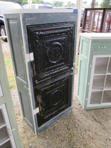 Primitive-style cabinet made from repurposed materials