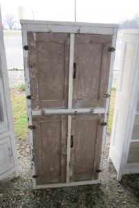Primitive-style cabinet made from repurposed materials
