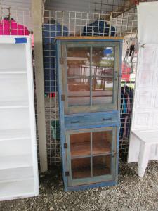 Primitive-style cabinet made from repurposed materials