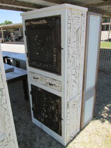 Primitive-style cabinet made from repurposed materials