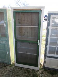 Primitive-style cabinet made from repurposed materials