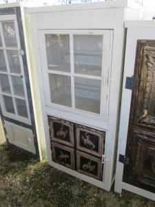 Primitive-style cabinet made from repurposed materials