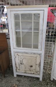 Primitive-style cabinet made from repurposed materials