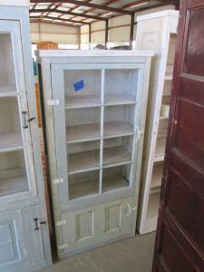 Primitive-style cabinet made from repurposed materials