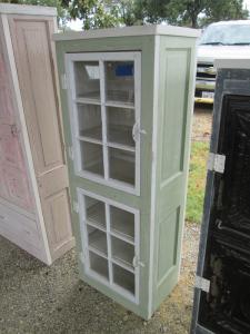 Primitive-style cabinet made from repurposed materials