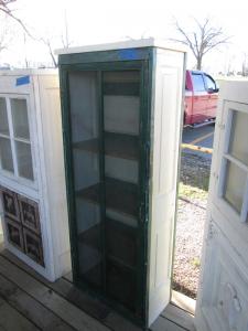 Primitive-style cabinet made from repurposed materials