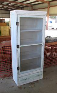 Primitive-style cabinet made from repurposed materials