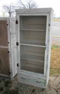 Primitive-style cabinet made from repurposed materials