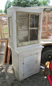 Primitive-style cabinet made from repurposed materials