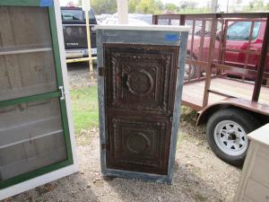 Primitive-style cabinet made from repurposed materials