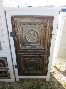 Primitive-style cabinet made from repurposed materials