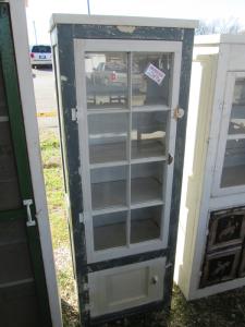 Primitive-style cabinet made from repurposed materials