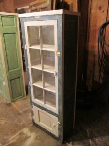 Primitive-style cabinet made from repurposed materials