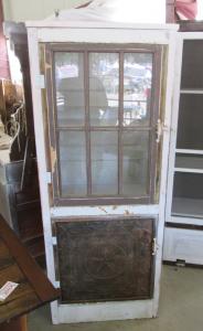 Primitive-style cabinet made from repurposed materials