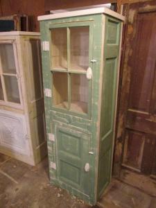 Primitive-style cabinet made from repurposed materials