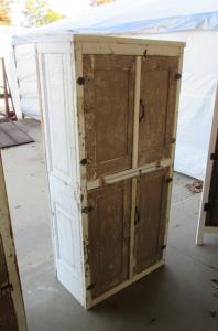 Primitive-style cabinet made from repurposed materials