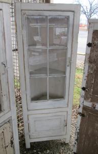 Primitive-style cabinet made from repurposed materials