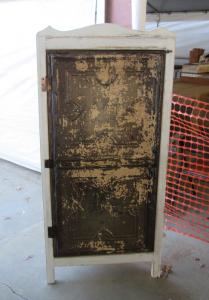 Primitive-style cabinet made from repurposed materials