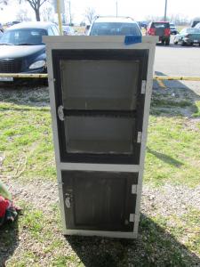 Primitive-style cabinet made from repurposed materials