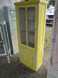 Primitive-style cabinet made from repurposed materials