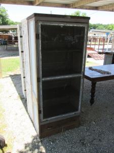 Primitive-style cabinet made from repurposed materials
