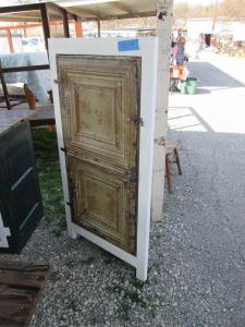 Primitive-style cabinet made from repurposed materials