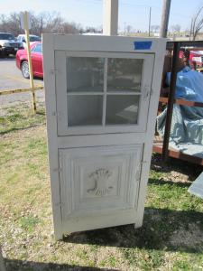 Primitive-style cabinet made from repurposed materials