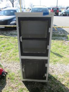 Primitive-style cabinet made from repurposed materials