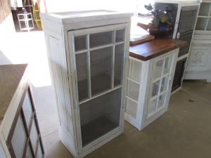 Primitive-style cabinet made from repurposed materials