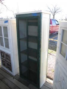 Primitive-style cabinet made from repurposed materials