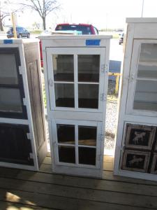 Primitive-style cabinet made from repurposed materials