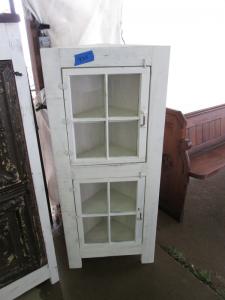 Primitive-style cabinet made from repurposed materials