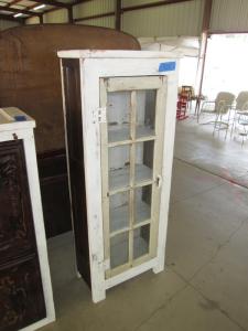 Primitive-style cabinet made from repurposed materials