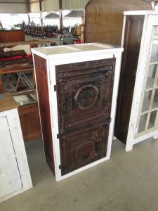 Primitive-style cabinet made from repurposed materials