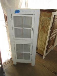 Primitive-style cabinet made from repurposed materials