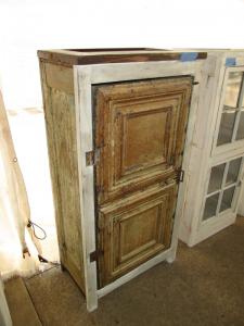Primitive-style cabinet made from repurposed materials