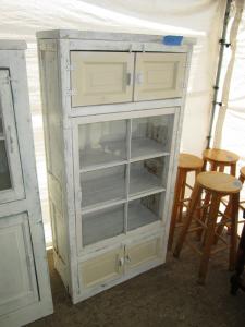 Primitive-style cabinet made from repurposed materials