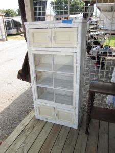 Primitive-style cabinet made from repurposed materials
