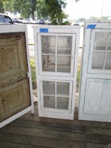 Primitive-style cabinet made from repurposed materials