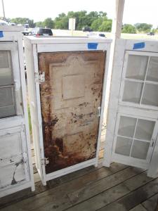 Primitive-style cabinet made from repurposed materials
