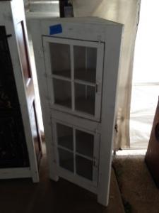Primitive-style cabinet made from repurposed materials