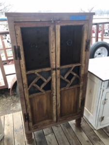 Primitive-style wine cabinet made from repurposed materials